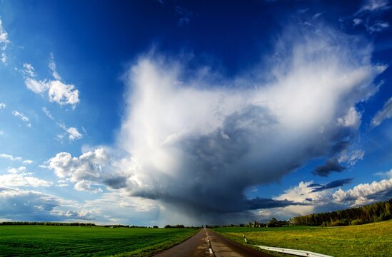 Cumulonimbus capillatus above fields