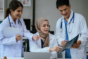 Medical team working on digital tablet healthcare doctor technology tablet using x-ray film analyzed the results of medical reports.