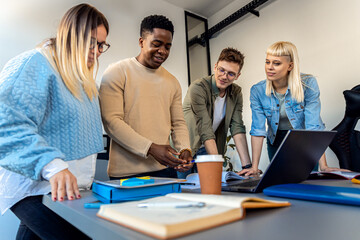 Obraz premium Diverse group of young people working on new project together in office.