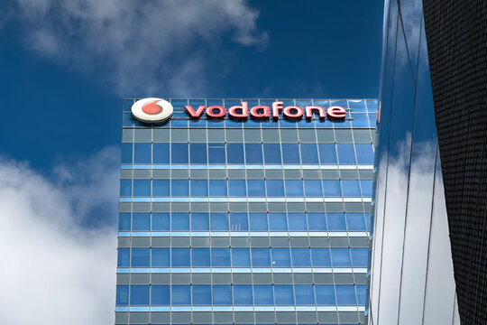 Bucharest, Romania - 30 May 2024: Vodafone. The logo sign of Vodafone telecommunication internet voice GSM company on top of the headquarters offices from Romania