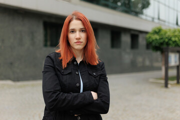 Fototapeta premium Adolescent Redhead Posing in the City