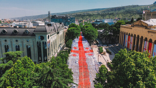 Independence Day in Georgia in may 26, Rustaveli Aveniu and Ribbons in the colors of the flag in front of the Parliament