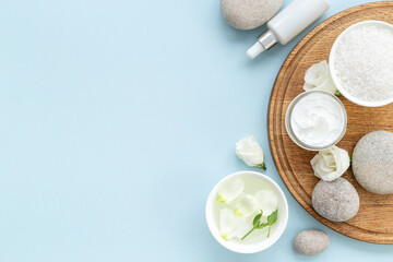 Set of cosmetic products on tray on the bathroom table