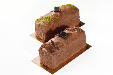 Artisanal sweet nutty chocolate cake bars on white background