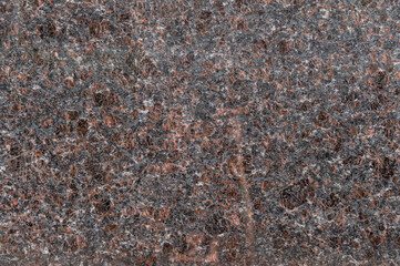 Red base with black detail of granite background