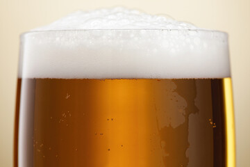 Beer. Glass of fresh and cold beer with bubbles. Craft beer. Shallow depth of field