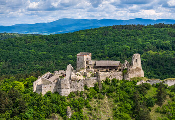Fototapeta premium Aerial View of Cachtice Castle, in front of Little Carpathians, Slovakia