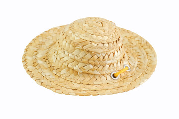 A straw hat adorned with a bright yellow ribbon, isolated on a white background
