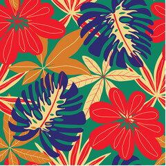 Abstract seamless tropical pattern with bright plants and leaves on a green background. Seamless exotic pattern with tropical plants. Jungle leaf seamless vector floral pattern background.