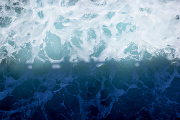 waves broken by the ferry - water background