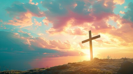 Jesus Christ cross. The Crucifixion, Resurrection and Easter concept. The Christian cross with a sunset scene in warm tone background with copy space