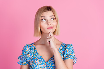 Portrait of nice young lady look empty space think wear top isolated on pink color background