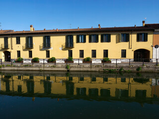 Historic buildings along the Naviglio Grande at Gaggiano, Milan, Italy