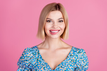 Photo of pretty young girl toothy smile bite lips wear top isolated on pink color background