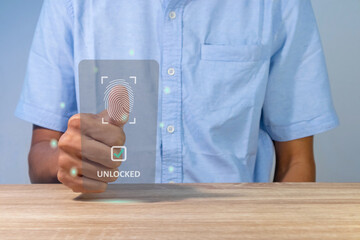 A man unlock and access to personal data by scanning fingerprint on virtual screen