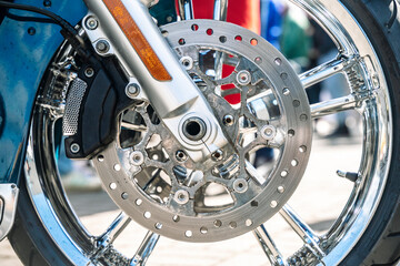 Motorcycle wheel and disc brake. Sports motorcycle wheel