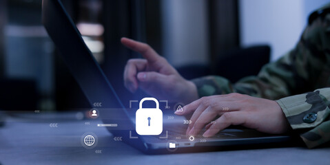 close up soldier man hand type o laptop to check security system of access data in private monitoring room with virtual icon for military operation control and command concept