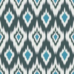 seamless knitted pattern. seamless ikat pattern on background. Dark green and white seamless ikat pattern