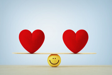 Two hearts on balance scale - Concept of love, reciprocity and happiness