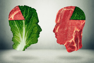 Food balance and health related eating choices with a human head shape green vegetable kale leaf with a piece of meat as a pie chart facing an opposite red steak for nutritional decisions and diet