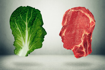 Food balance and health related eating choices. Red steak vs green lettuce shaped as human head. Nutrition, diet concept