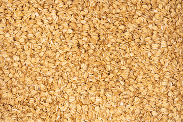 Oat-flakes as a background. Top view.