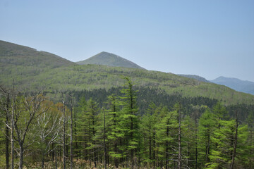 The peaceful landscape view from the top of Karikachi mountain pass in Hokkaido Japan