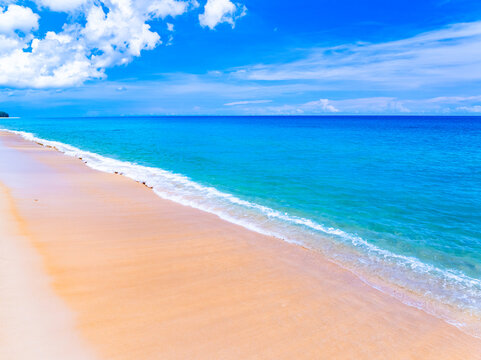 Amazing Top view sea beach landscape background,Summer sea waves crashing on sandy shore seascape background,High angle view ocean nature background