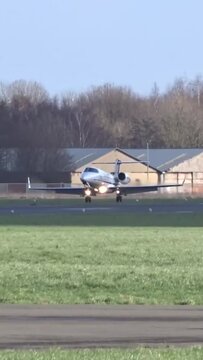 Business Jet Landing at Regional Airport Private Business Corporate Executive Jet Landing at International Airport. Arrival Arriving