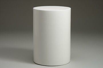 Minimalist white cylindrical pedestal on a neutral background, ideal for product showcases