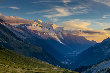 Fototapeta premium Chamonix Montblanc beautiful alpine mountain summits landscape. Alps mountains with snow and glacier above green valley of Chamonix in France. Alps beautiful scenery in summer
