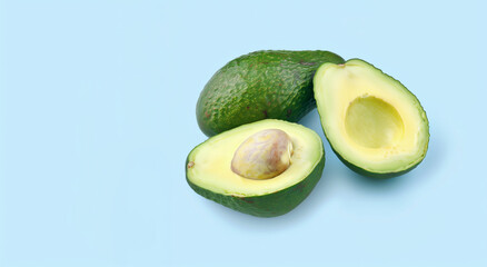 Three Avocados Blue Background: Avocado Halfes with Seed Isolated on Light Blue Backdrop - Minimalist Healthy Food Concept with Copy Space