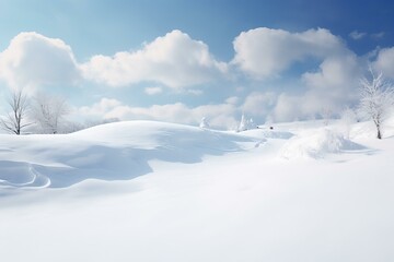 Tranquil winter scene with pristine snow and fluffy clouds against a clear blue sky