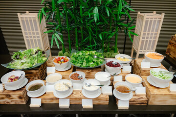 Salad bar with fresh vegetables in buffet in all inclussive hotel