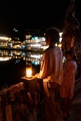My family with a lamp Night view at Pilok, Kanchanaburi Ban E-Tong in Pilok Thailand