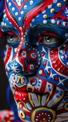 Fototapeta premium Close-up of a woman's face with vibrant red, white, and blue face paint.