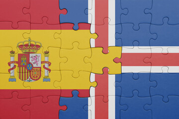 puzzle with the colourful national flag of iceland and flag of spain.