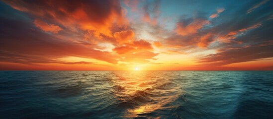 Dramatic clouds above wide pacific ocean at sunset. Creative banner. Copyspace image