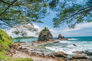 Gunungkidul, Indonesia - November 6, 2016. the beauty of Wawtulumbung Beach during the day.