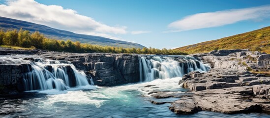 Waterfall in Abisko national Park. Creative banner. Copyspace image