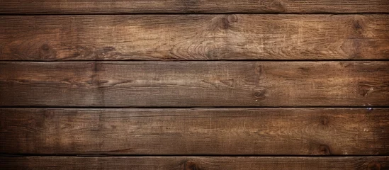 An aged wooden surface with a textured background perfect for adding text or elements in the copy space image © StockKing