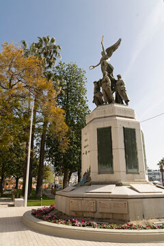 World War I memorial statue reading "A Nos Morts" ("to our dead") and commemorating battles at Yser, Somme, and Champagne, in the city of Cannes, France.