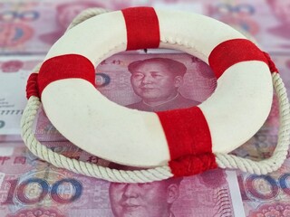 Chinese money and lifebuoy concept of help from China concept 