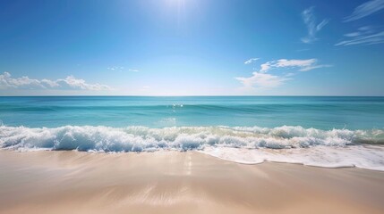 Obraz premium Serene seascape with calm blue waters reflecting the bright blue sky, perfect for relaxing travel.
