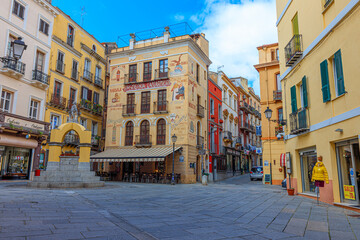 Facade of pastry shop "Pasticceria Lamarmora" and Maimoni fountain. Iglesias, Sardinia, Italy © murasal