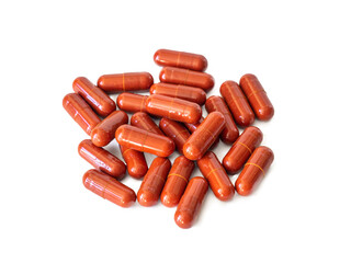 Turmeric and Red Yeast Rice Extract Powder. Dietary supplement capsules on a white background