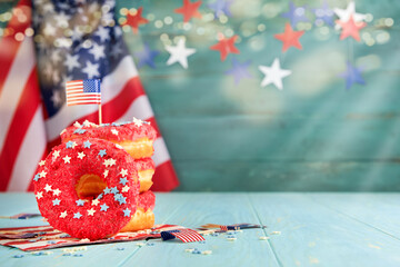 Patriotic sweet donuts 4th july with american flag. Delicious american donuts with red icing, blue,...
