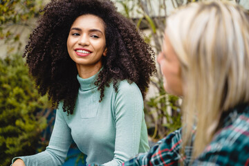 Women Socializing Outdoors - Casual Conversation