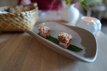 pork belly snack with coconut flake