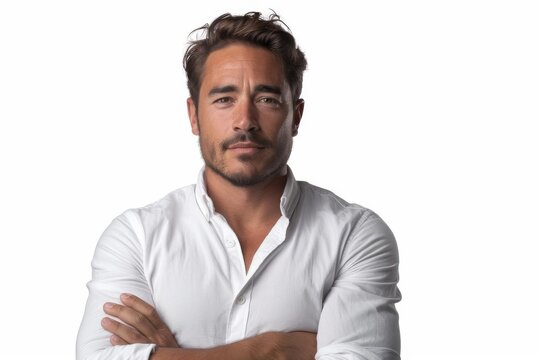 Entrepreneur with crossed arms, displaying determination and ambition, against a white background